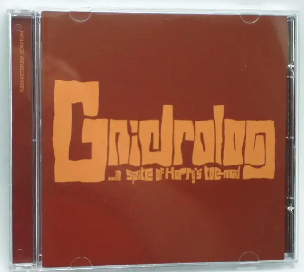 Gnidrolog - In Spite Of Harrys Toe Nail