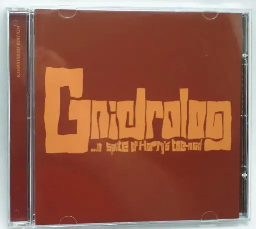 Gnidrolog - In Spite Of Harrys Toe Nail
